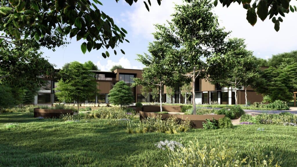 Modern office buildings surrounded by lush greenery in Blisworth.